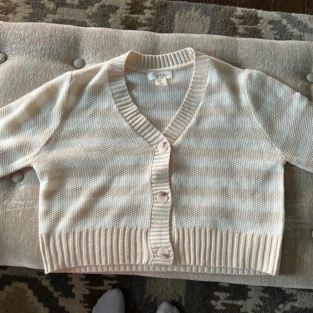 Cream and white knit cardigan, never been worn.